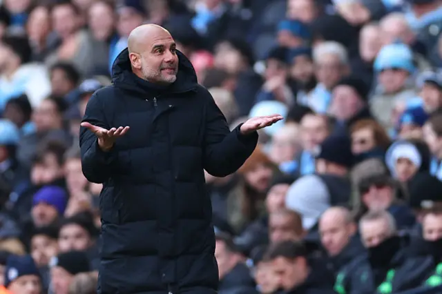 Pep Guardiola reacts on the touchline