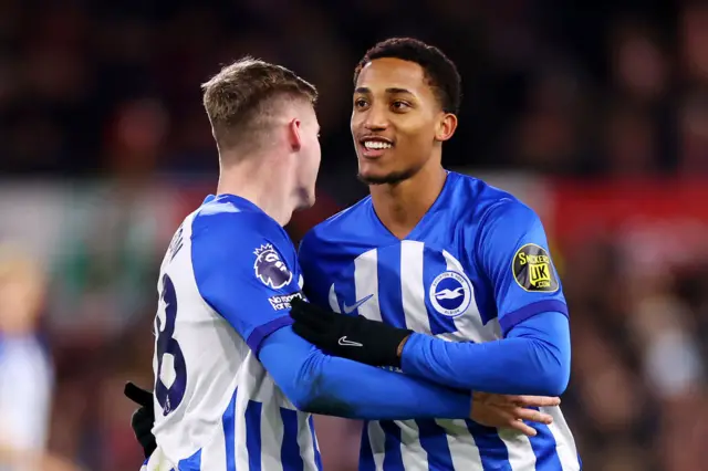 Joao Pedro celebrates their victory with Ferguson.