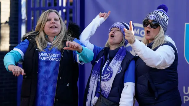 Portsmouth fans sing outside Fratton Park ahead of the game against Blackpool in League One