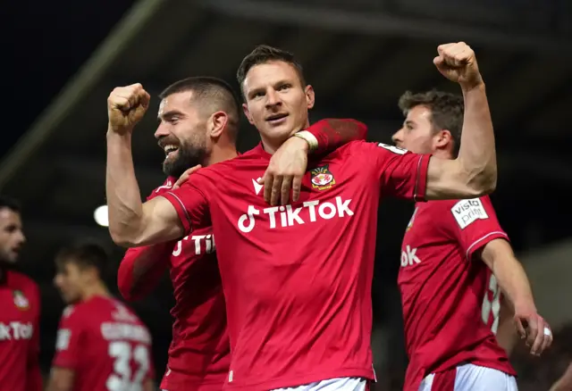 Lewis Mullin celebrates a goal for Wrexham