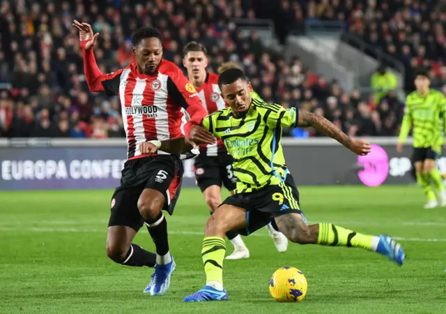 Ethan Pinnock tries to dispossess Gabriel Jesus