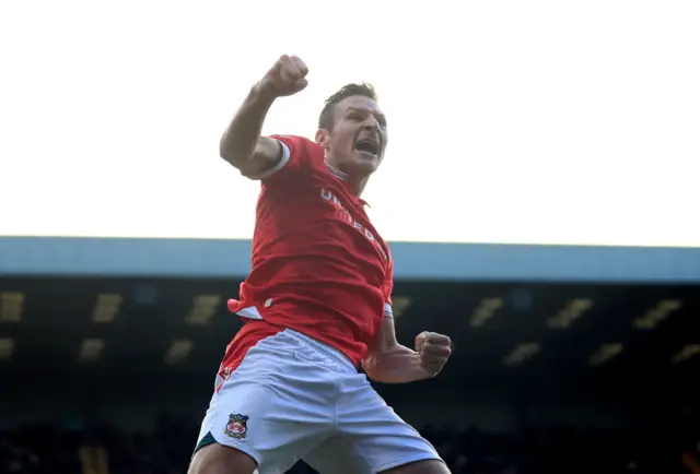 Paul Mullin celebrates scoring for Wrexham