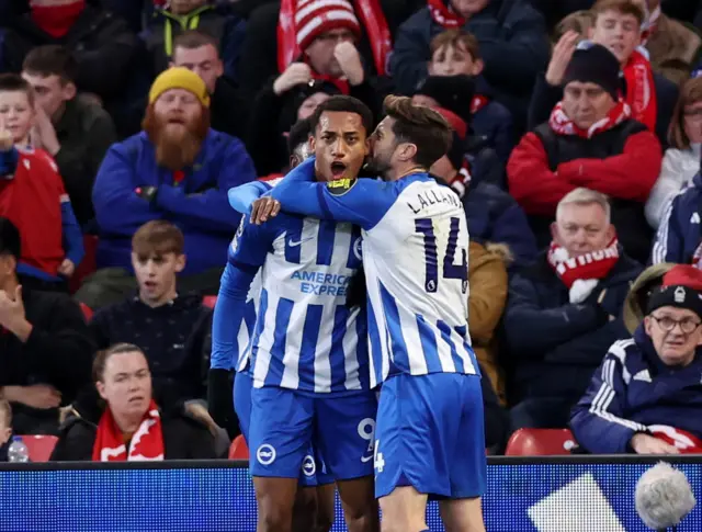 Joao Pedro celebrates.