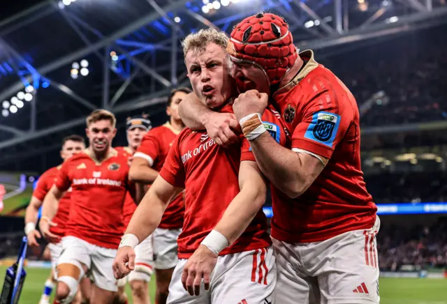 Munster's Craig Casey celebrates the game's opening try