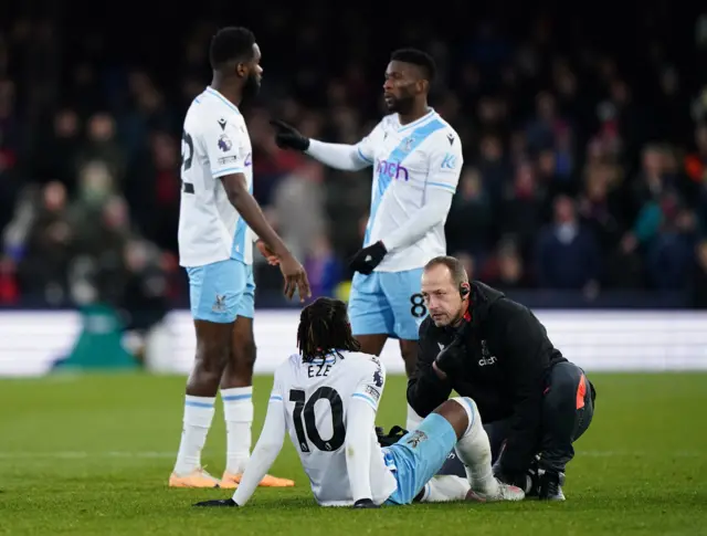 Eberechi Eze receives treatment.