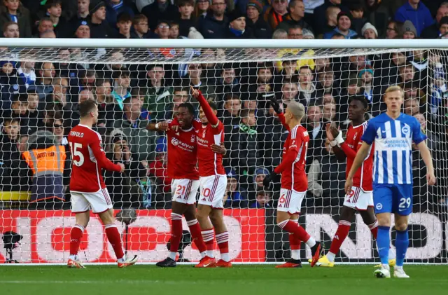 Anthony Elanga celebrates his goal with team mates.