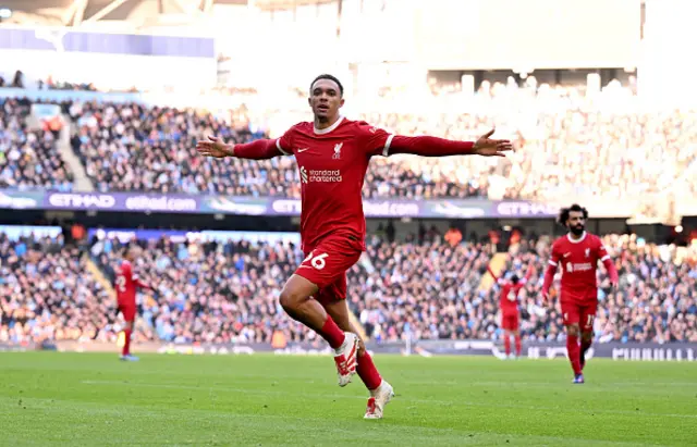 Trent Alexander-Arnold of Liverpool celebrates after scoring the equalising goal