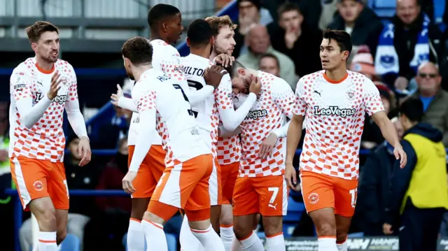 Blackpool celebrate taking the lead at Portsmouth