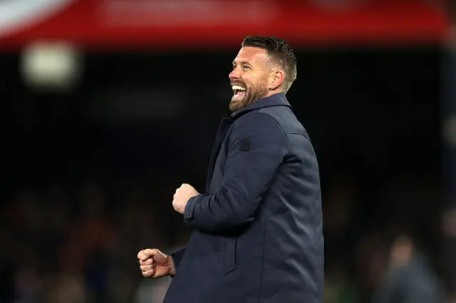 Rob Edwards smiles after the full-time whistle