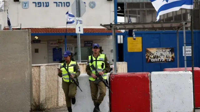 Israeli security guards the military prison of Ofer near Jerusalem, Israel, 25 November 2023, ahead of an expected release of Palestinian prisoners.