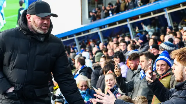 Wayne Rooney shakes hands with Birmingham fans