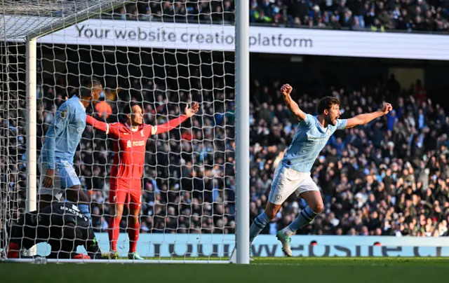 Ruben Dias of Manchester City celebrates scoring a goal