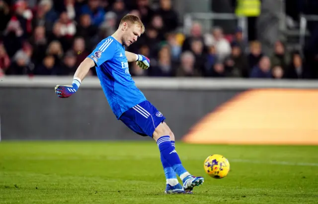 Aaron Ramsdale kicks the ball.