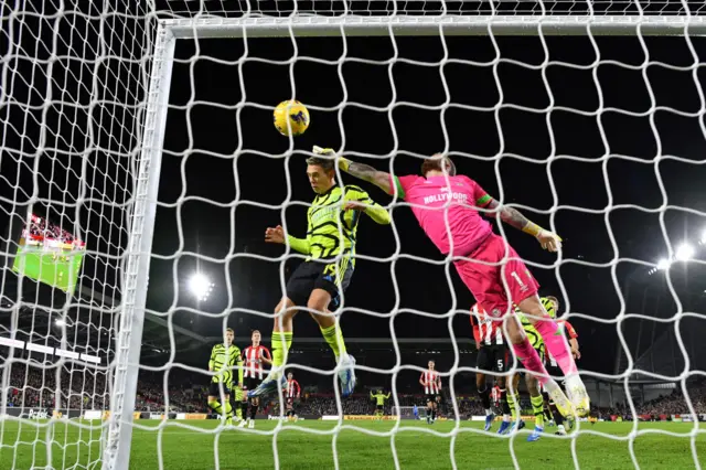 Leandro Trossard heads the ball which was later ruled offside