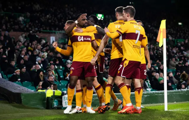 Motherwell celebrate their late equaliser at Celtic Park