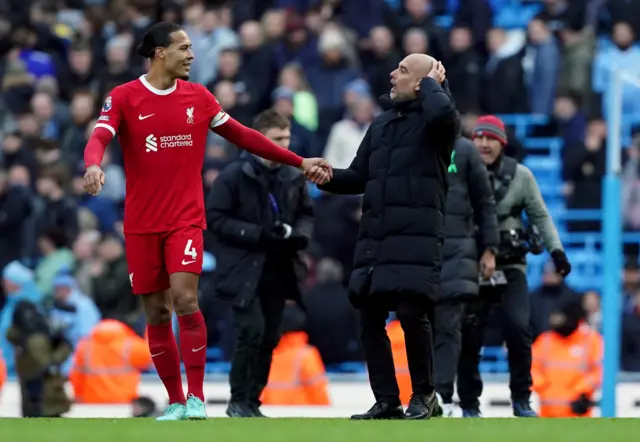 Virgil van Dijk and Pep Guardiola.