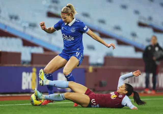 Justine Vanhaevermaet of Everton is tackled by Kenza Dali