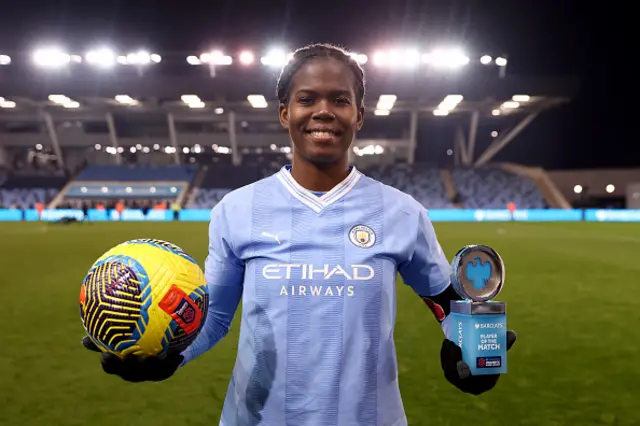 Khadija Shaw of Manchester City poses for a photo with the Player of the Match trophy