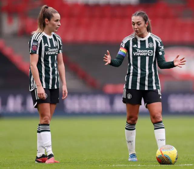 Ella Toone and Katie Zelem before a dead ball situation.