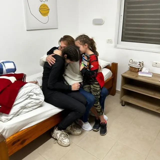 Maayan Zin reunites with her daughters Dafna and Ela after they were released from Hamas