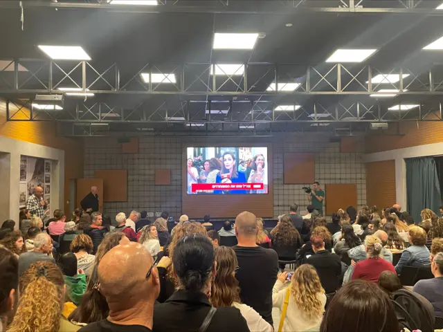 Families of hostages watching Israeli TV as they wait for hostages to be released