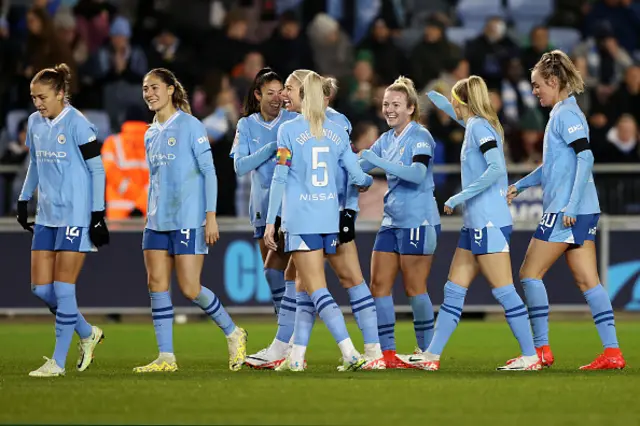 Lauren Hemp of Manchester City celebrates with teammates