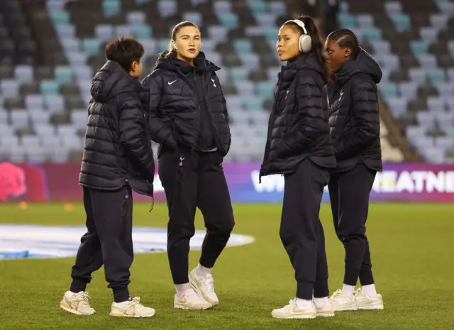 Gracie Pearse and Asmita Ale of Tottenham Hotspur inspect the pitch