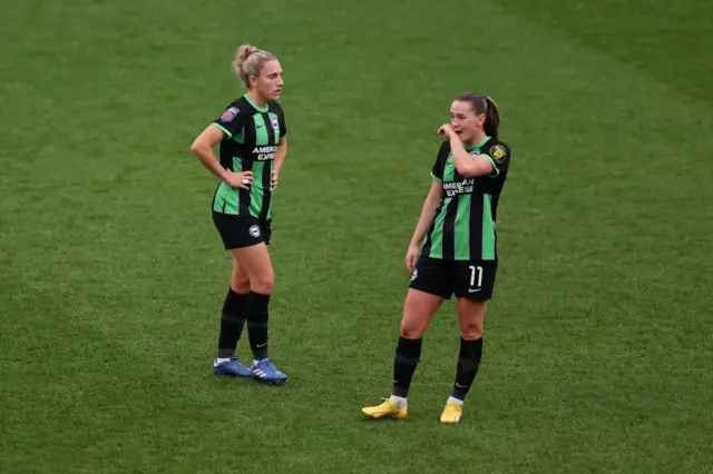 Maisie Symonds and Elisabeth Terland of Brighton & Hove Albion look dejected