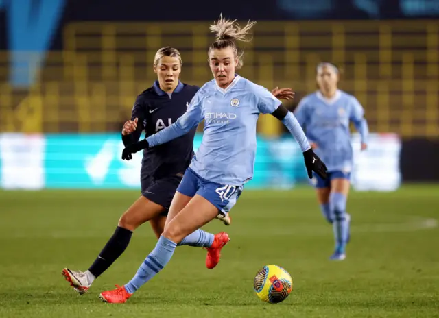 Jill Roord and Celin Bizet Ildhusoy chase the ball