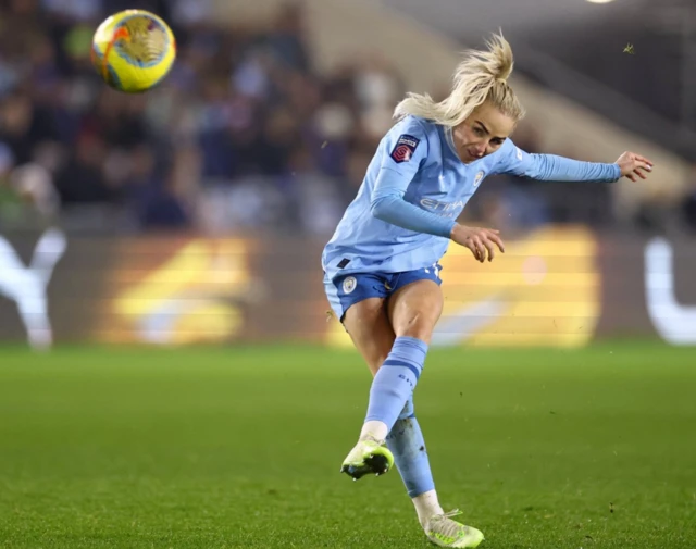 Alex Greenwood takes a free-kick