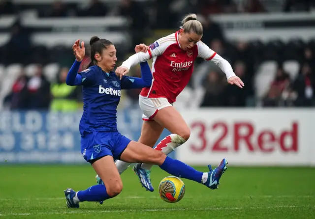 West Ham United's Abbey-Leigh Stringer in action against Arsenal’s Alessia Russo.