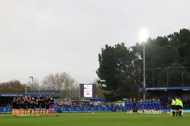 A minute's silence is held at Kingsmeadow.