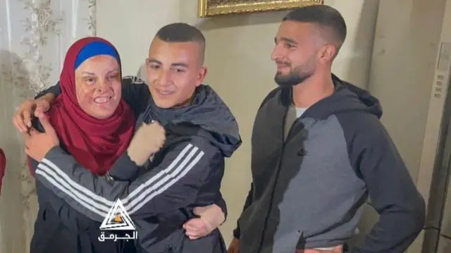 Palestinian woman Israa Jaabis, 38, hugged her son Mua’tassim after being released