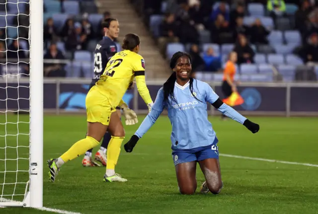 Bunny Shaw celebrates her second on her knees.