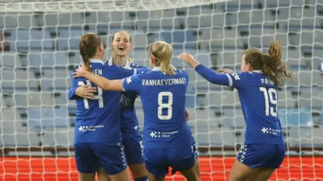 Nathalie Bjoern of Everton celebrates with teammates after scoring the team's second goal