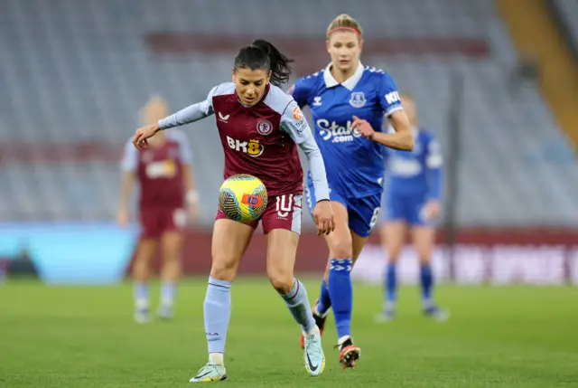 Kenza Dali of Aston Villa on the ball whilst under pressure from Justine Vanhaevermaet.