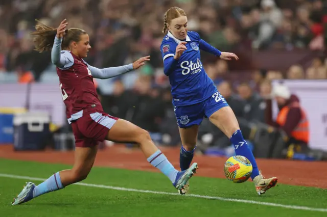 Sarah Mayling of Aston Villa challenges for the ball with Everton's Sara Holmgaard