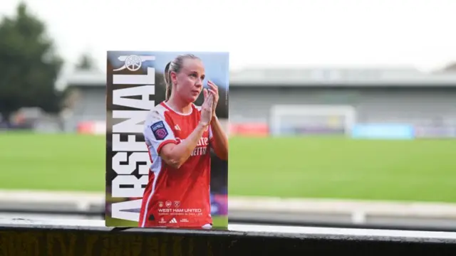 A photo of the programme for Arsenal vs West Ham showing Beth Mead