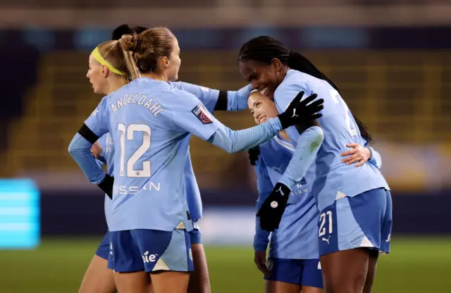 Khadija Shaw of Manchester City celebrates with teammates