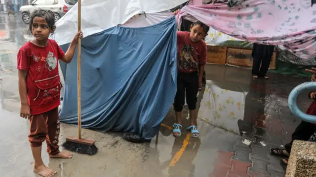 Two young Palestinian children taking shelter in an UNRWA school