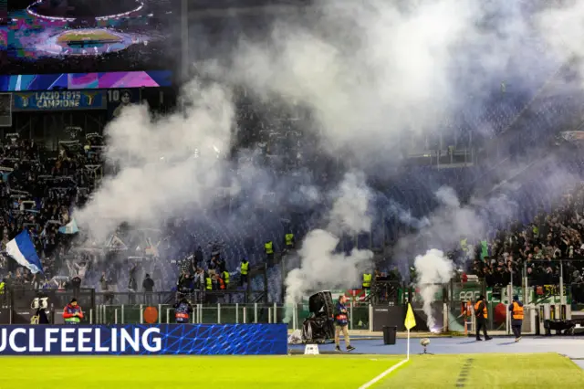 Plumes of smoke inside the stadium