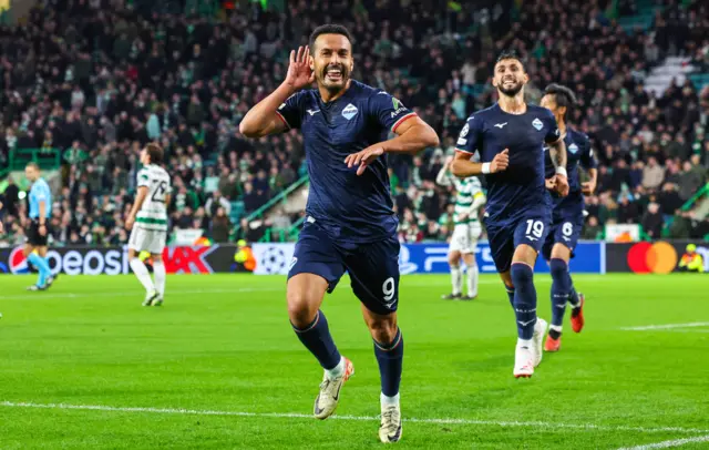 Pedro celebrates his 95th-minute goal in Glasgow