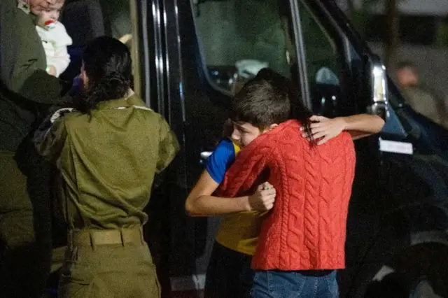 12-year-old Eitan Yahalomi is reunited with his mother after returning to Israel from Gaza