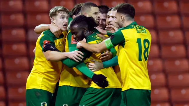 Horsham players celebrate their goal