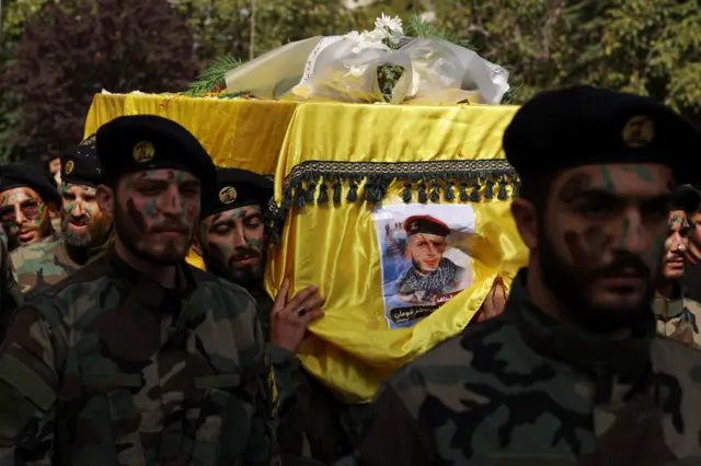 Members of Hezbollah carry the coffin of Hezbollah member Abbas Shuman, who was killed in southern Lebanon amidst tension between Israel and Hezbollah, during his funeral, in Baalbek, Lebanon, October 23, 2023.