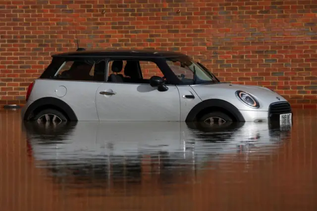 car submerged in car park