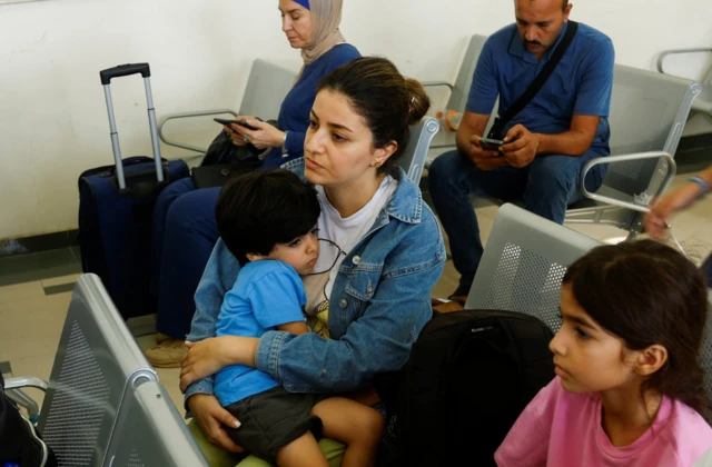 Palestinian families holding foreign passports are at the Rafah border crossing to Egypt, waiting for permission to leave Gaza - 3 November 2023