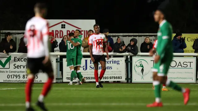 Walsall players celebrate their equaliser against Sheppey