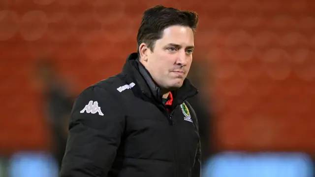 Horsham manager Dominic Di Paola on the pitch before kick-off