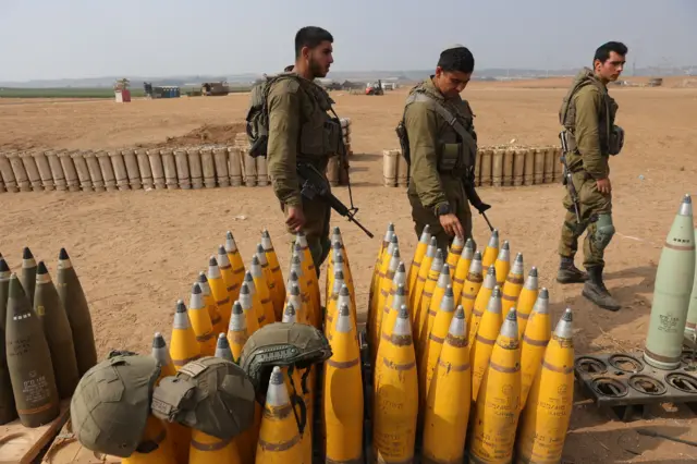 Israeli soldiers of an artillery unit preparing ammunition near the Gaza border, southern Israel , 02 November 2023.